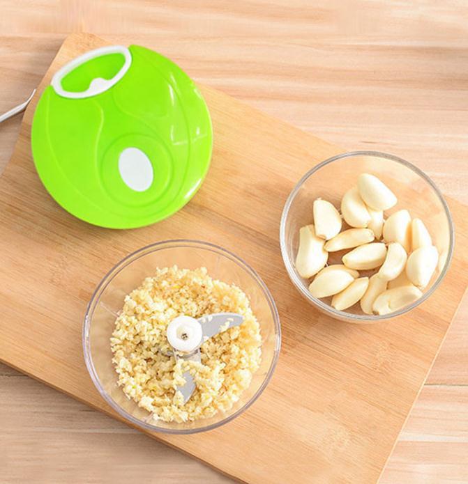 Manueller Zwiebelhacker mit Handseilzug und Knoblauchpresse aus Edelstahl.